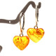 Heart-shaped honey-colored amber earrings with a 925 silver hook