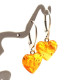 Heart-shaped honey-colored amber earrings with a 925 silver hook