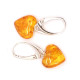 Heart-shaped honey-colored amber earrings with a 925 silver hook