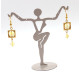 Gold-colored earrings with yellow polished amber