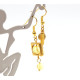 Gold-colored earrings with yellow polished amber