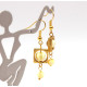 Gold-colored earrings with yellow polished amber