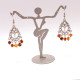 Earrings with cognac-colored baroque-shaped amber pieces
