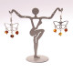 Butterfly-shaped earrings with amber pieces in baroque shape in cognac color