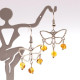 Butterfly-shaped earrings with amber pieces in baroque shape