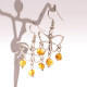 Butterfly-shaped earrings with amber pieces in baroque shape