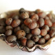Unpolished baroque shaped amber beads in dark cognac color 4-6.5 mm