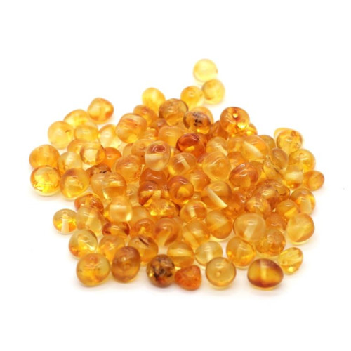 Polished baroque style amber lose beads in honey color 4-6.5 mm
