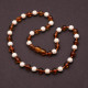 Polished Baroque Style Cognac Baltic Amber With Onyx Teething Necklace