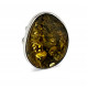 Adjustable Sterling Silver Ring with Green Baltic Amber