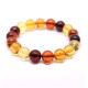 Luxury Bracelet made of Amber Balls of different colors 11mm
