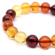 Luxury Bracelet made of Amber Balls of different colors 11mm