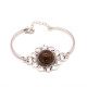 Bracelet with greenish amber and plant inclusions