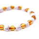 Polished Baroque Style Honey Baltic Amber Adult Bracelet with Howlite