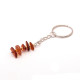 Key-ring with polished amber
