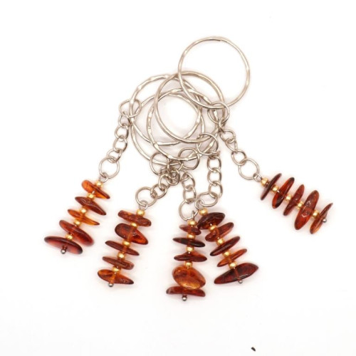 Key-ring with polished amber