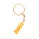 Key-ring with polished amber