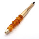 Pen with amber