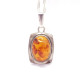 Antique Silver Pendant with Polished Cognac Baltic Amber
