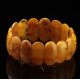 Antique Vintage EGG YOLK pieces Baltic amber stretch bracelet 26
