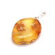 Polished amber pendant amulet with Mara's cross