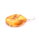 Polished amber pendant amulet with Mara's cross