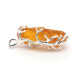 Raw amber pendant in a metal frame 47