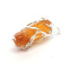 Raw amber pendant in a metal frame 47