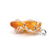 Raw amber pendant in a metal frame 47